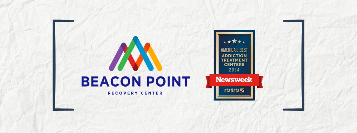beacon point logo with newsweek award