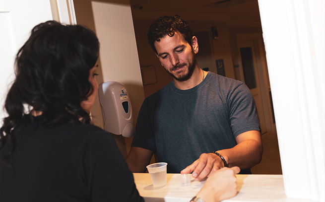 patient with a nurse getting medications in Philadelphia